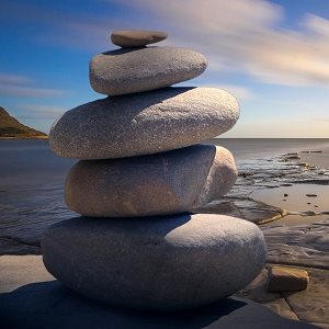 Midfulness metaphor stacked stones calm