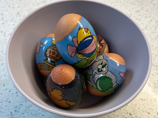Hard boiled eggs are hand painted in Poland and called pisanki. These eggs have colourful pictures of chicks and bunnies.