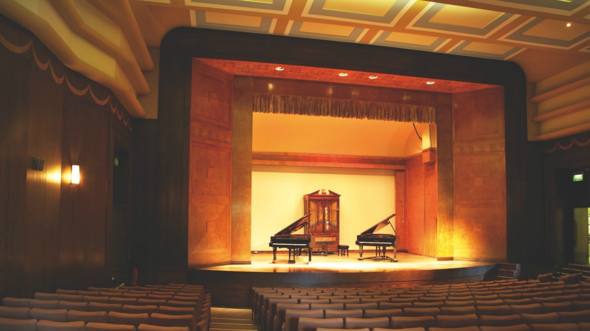 The Barber concert hall with two grand pianos on stage.