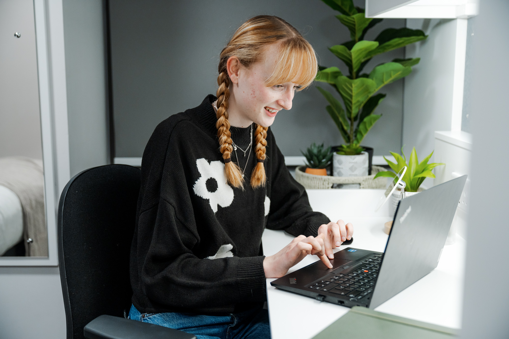 Student on their laptop in accommodation