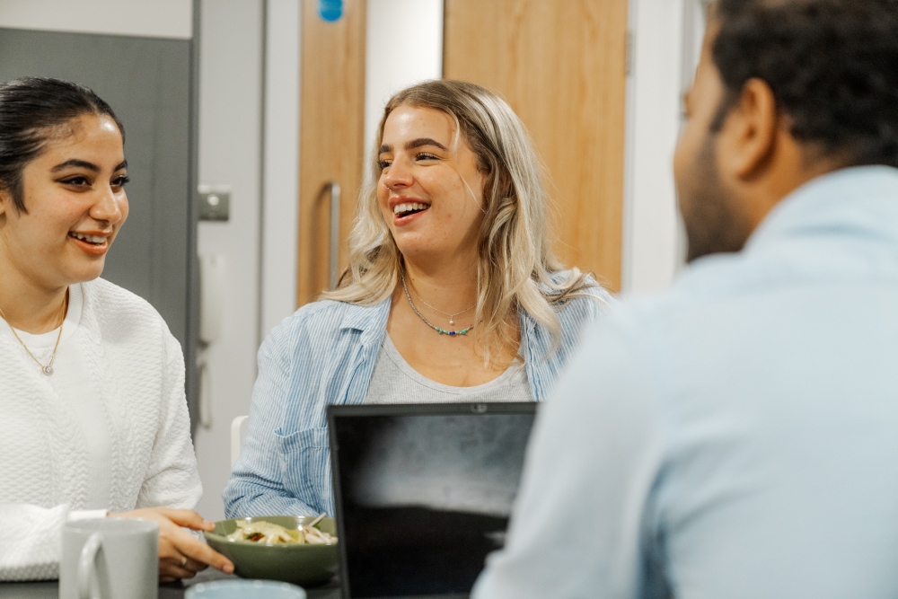 Students laughing in accommodation