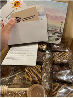 Brownies in a box with art work and a personalised card.