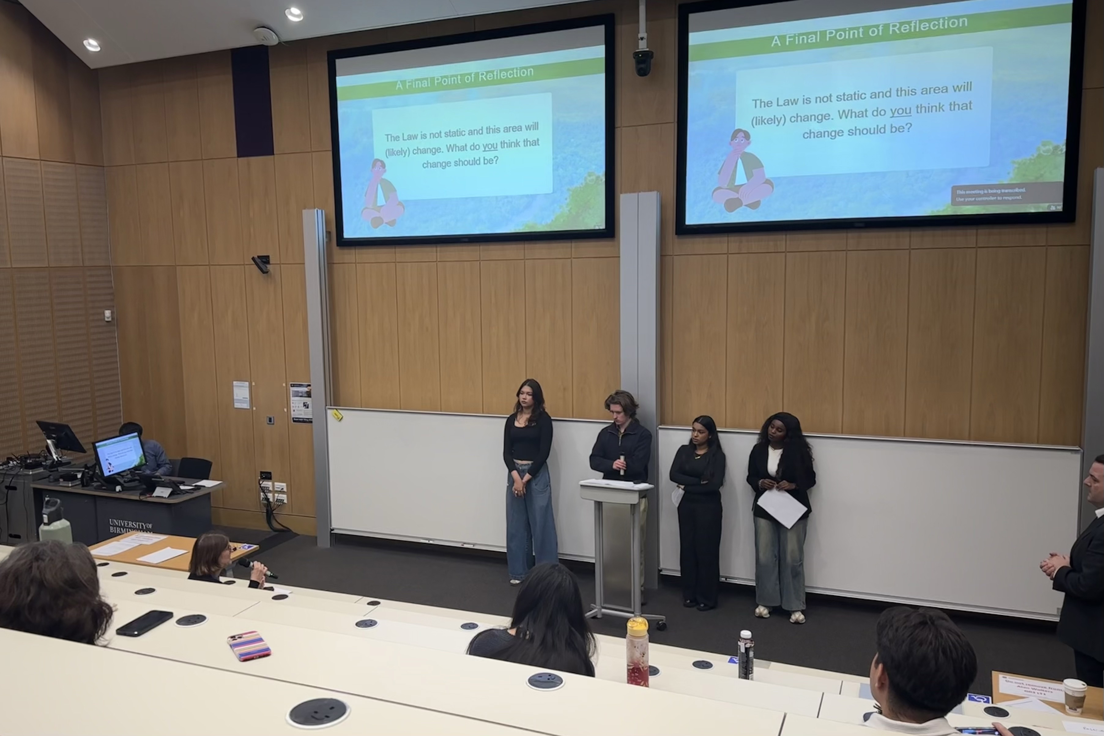 Four student speakers presenting