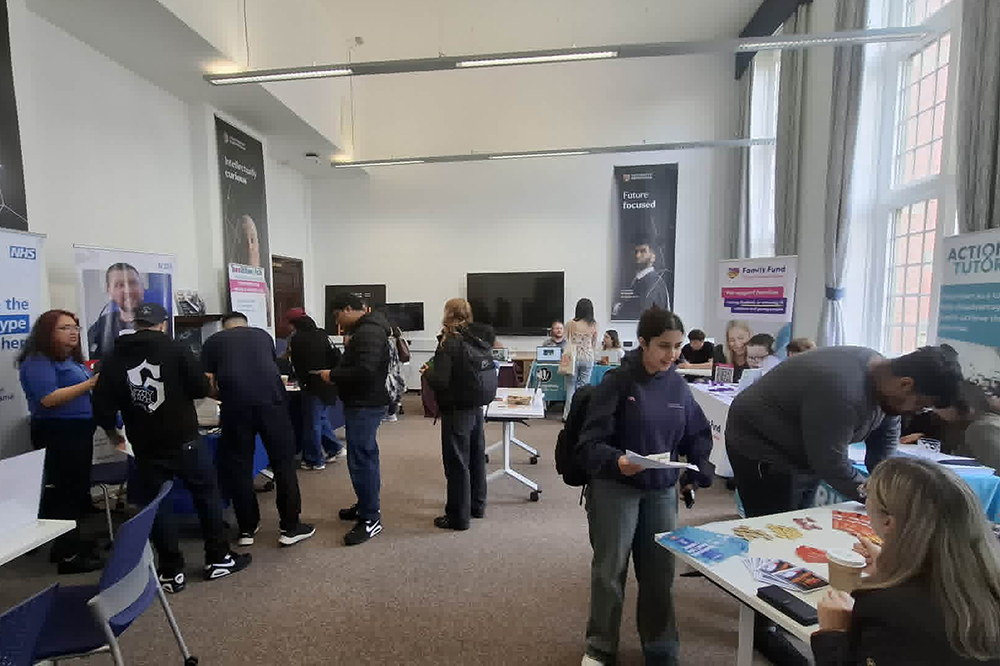 Students and exhibitors gathering in room G30