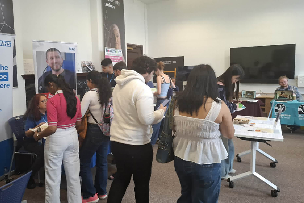 Students and exhibitors gathering in room G30