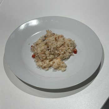 A plate of thai spicy salmon salad with rice