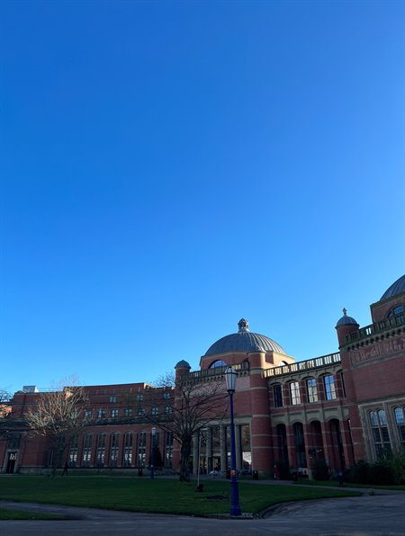 The Brammall Music building is framed against a blue sky.