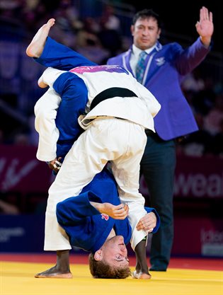 Charlie tackling another Judo athlete